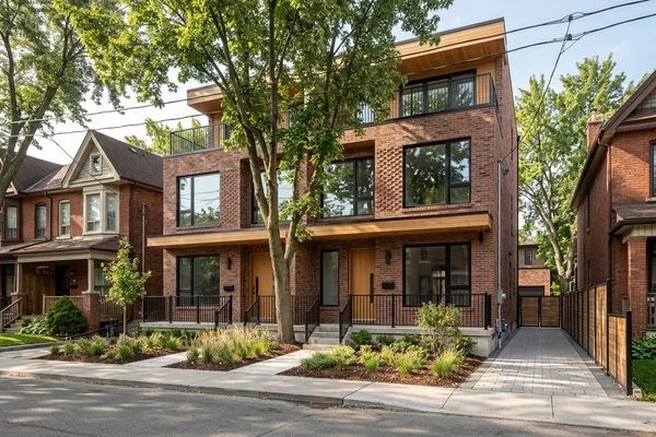 New fourplex with a narrow side yard approved through a minor variance